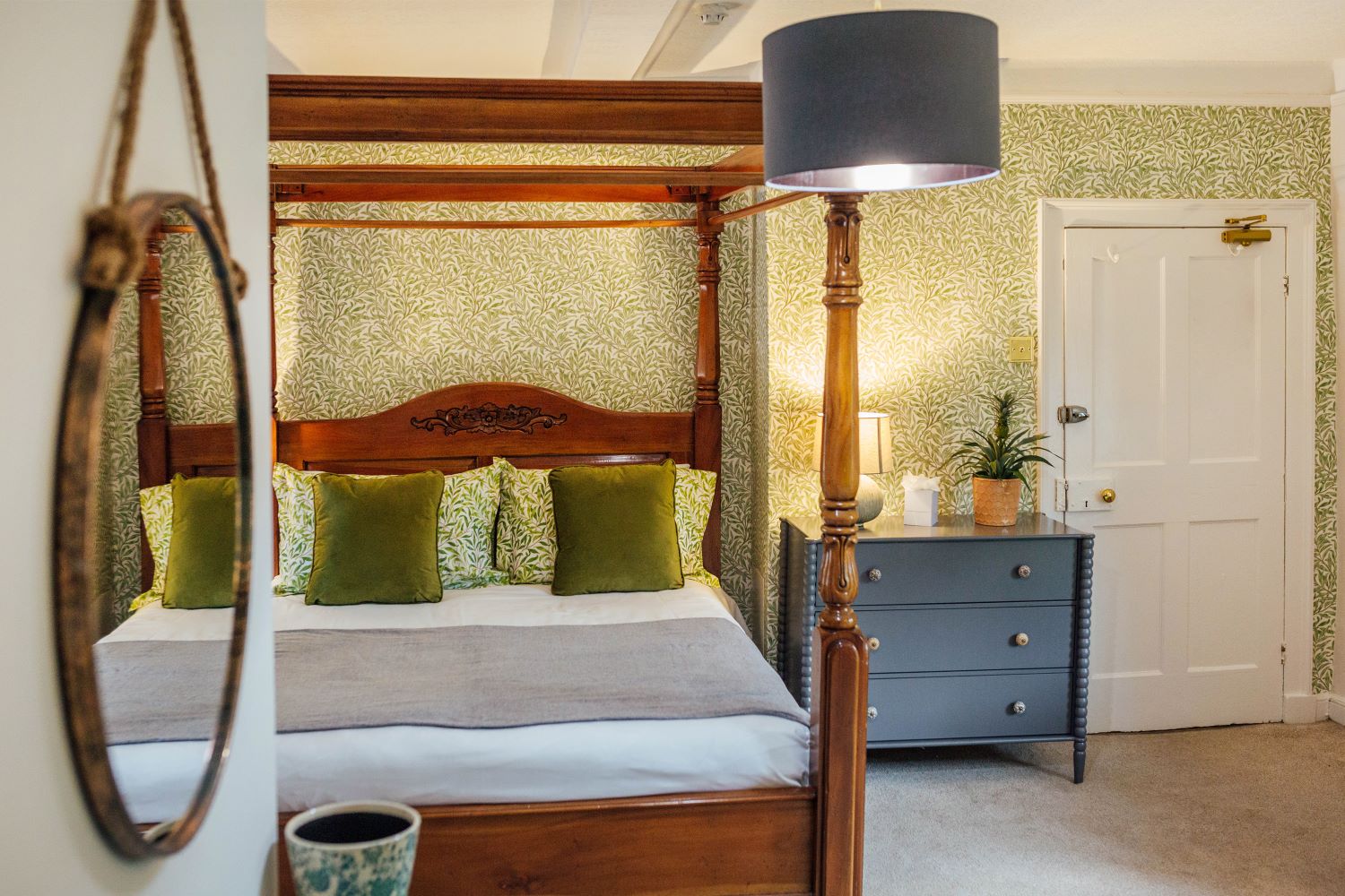 Four Poster king size bed, used as the Honeymoon Suite. Decorated in Willow themed wallpaper